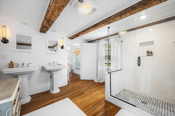 a bedroom with a bed and a fireplace