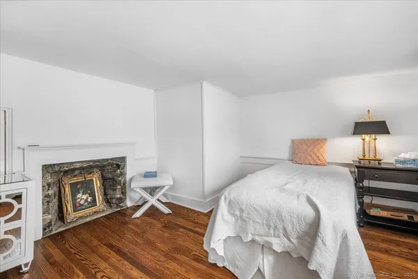 a bathroom with a sink a mirror and a shower