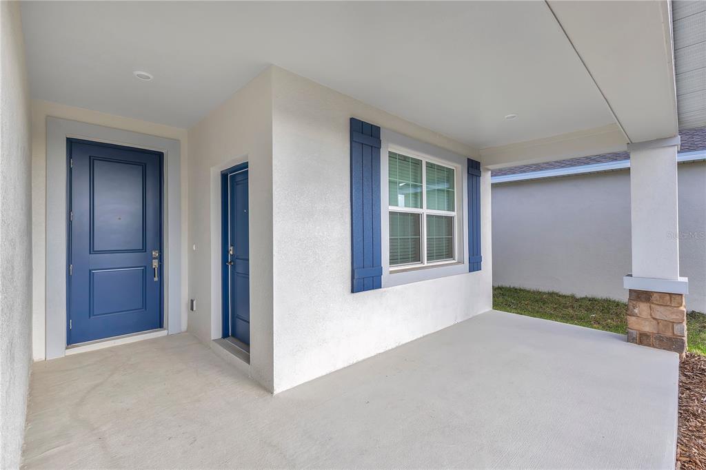3257 Addison Boulevard, Unit B St. Cloud, FL 34771 - Photo 2 of 9 a view of an empty room with a window