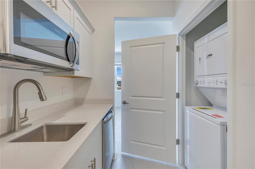 3257 Addison Boulevard, Unit B St. Cloud, FL 34771 - Photo 5 of 9 a close view of sink and tap