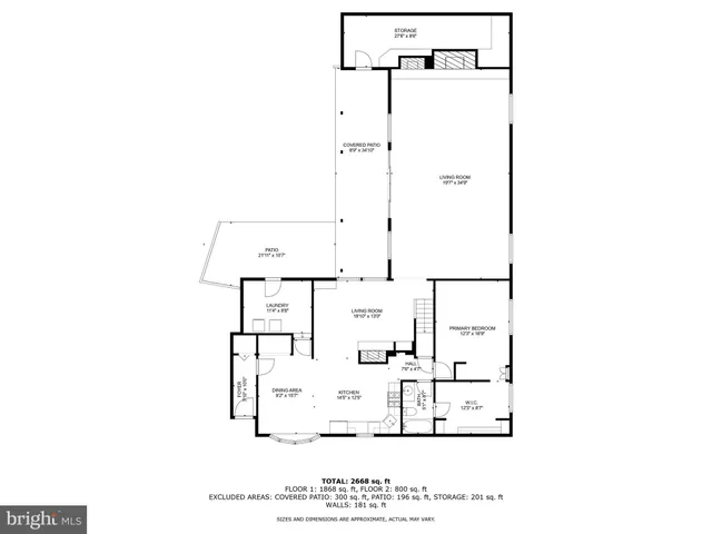 a front view of a building with a garden