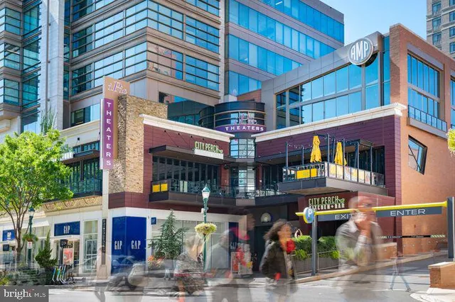 a view of a house with garden and trees
