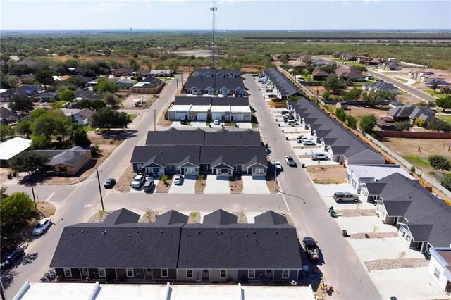 a view of a city with an ocean view
