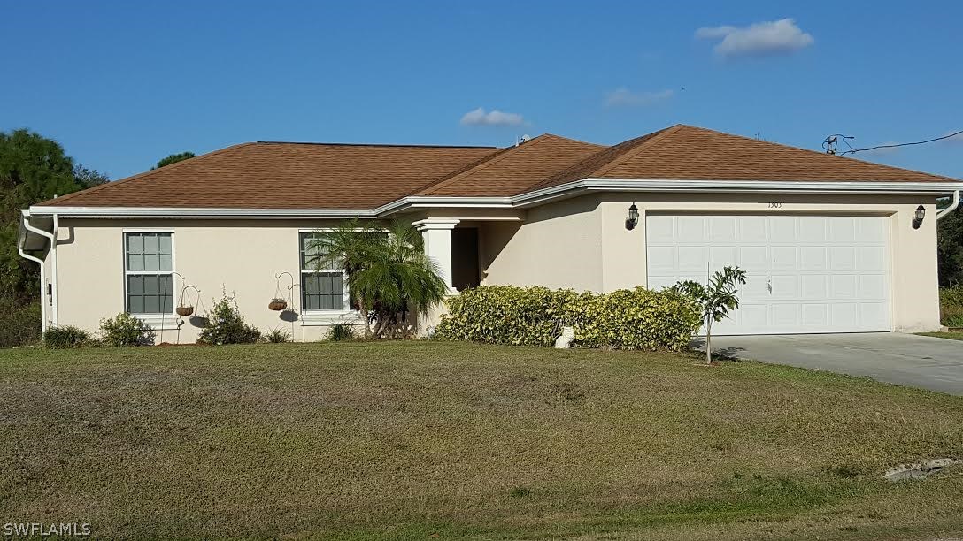 1303 Meadow Road Lehigh Acres, FL 33976 - Photo 1 of 25 Gallery Image 1