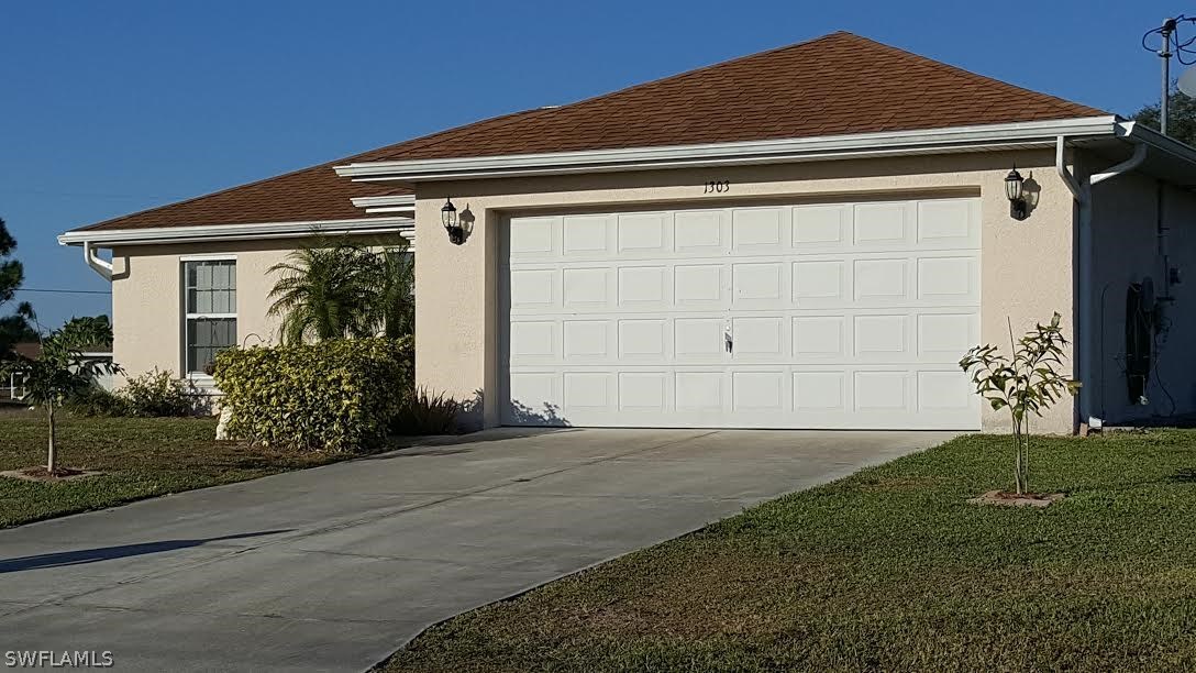 1303 Meadow Road Lehigh Acres, FL 33976 - Photo 2 of 25 Gallery Image 2
