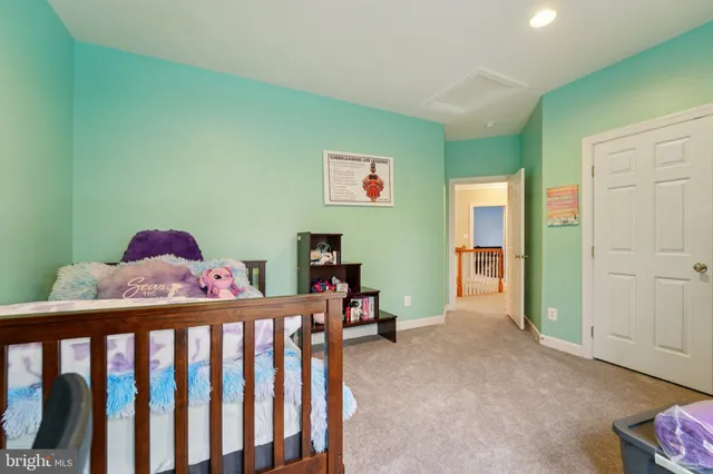 a bedroom with furniture and a bed