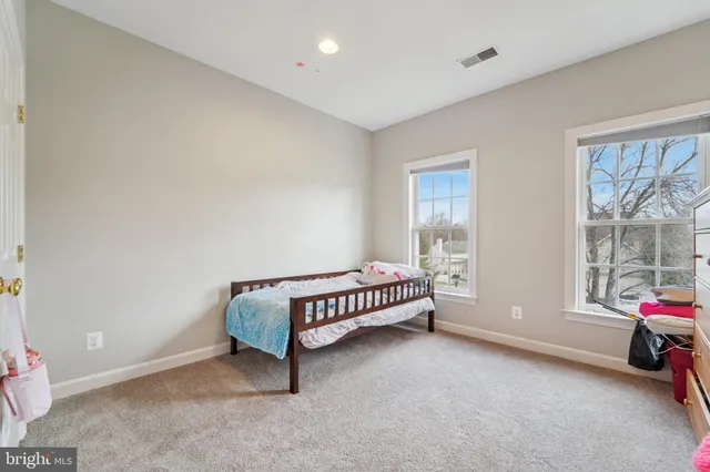 a room with furniture and a window