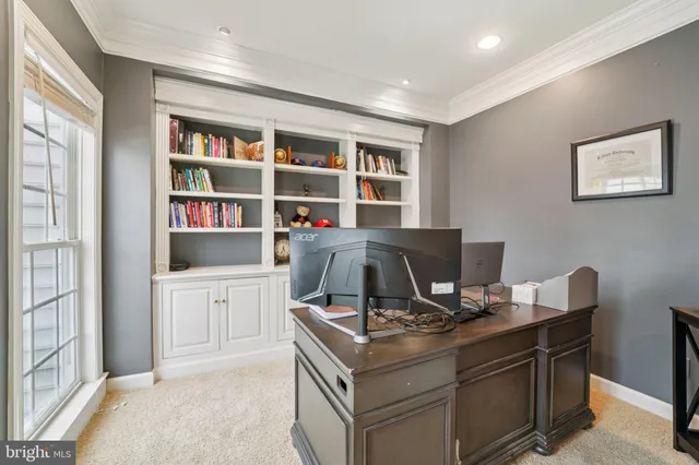 a view of a workspace with furniture