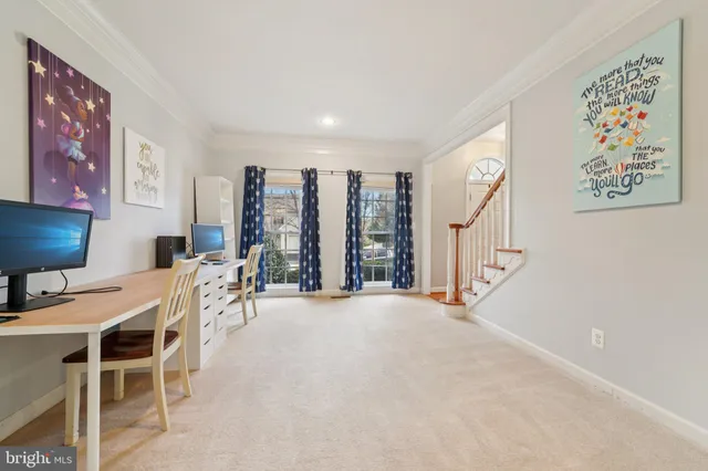 a view of a livingroom with furniture and window