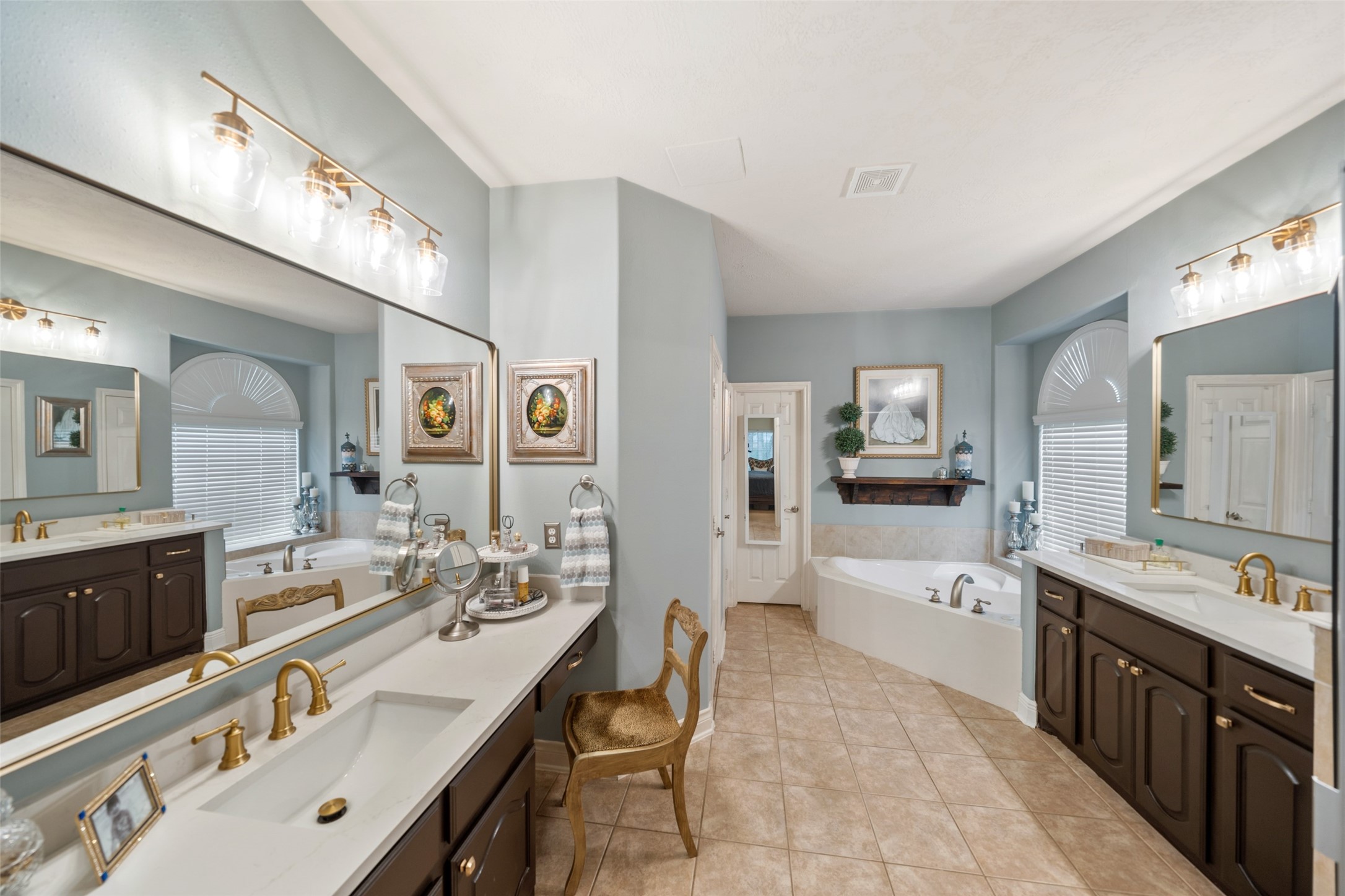 30719 Aldine Westfield Road Spring, TX 77386 - Photo 23 of 35 Primary Bathroom with His and Her Vanities, Garden Tub, and Large Walk-in Shower
