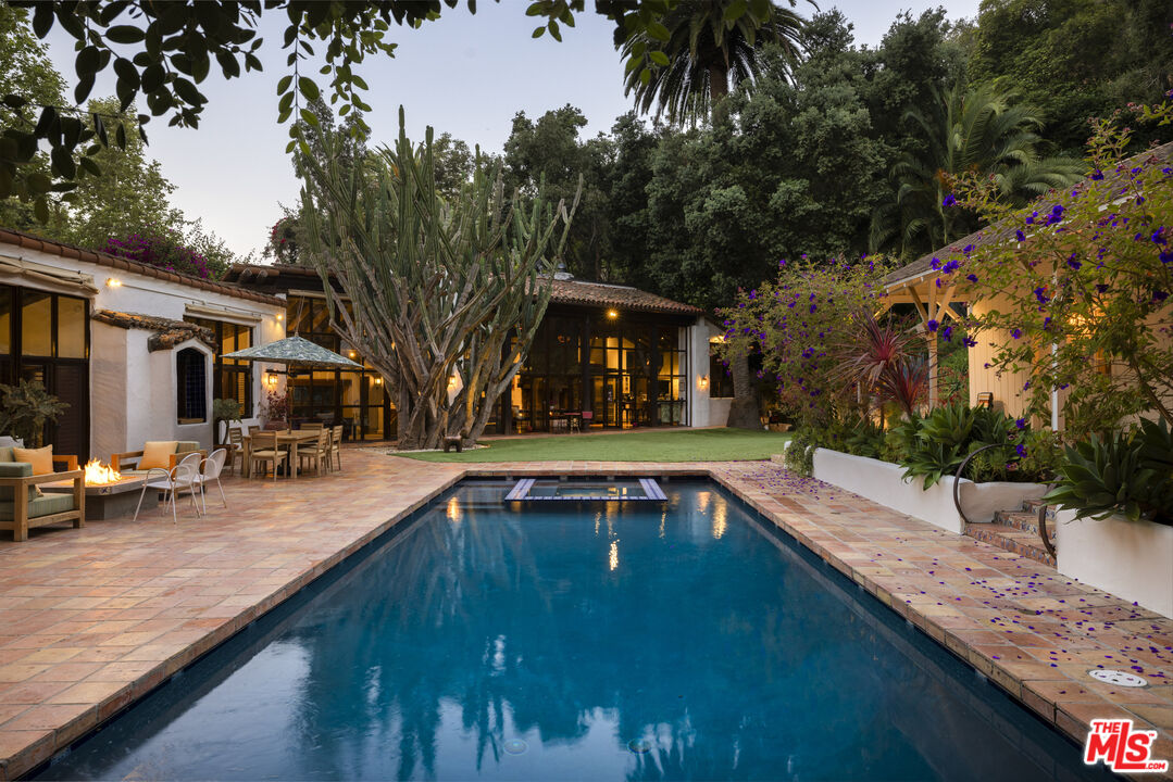 a view of a house with swimming pool