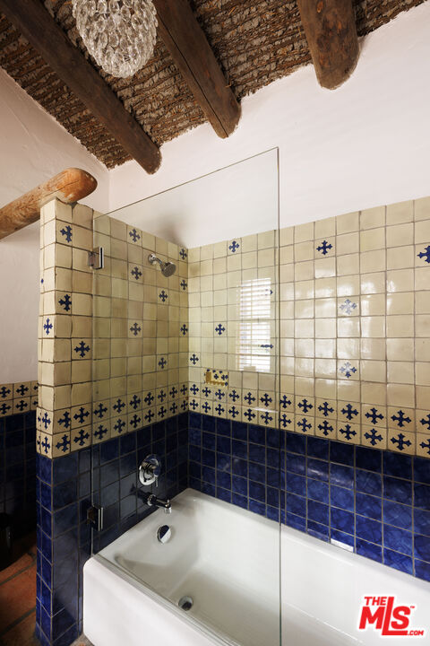 659 East Channel Road Santa Monica, CA 90402 - Photo 11 of 22 a bathroom with a bathtub and shower