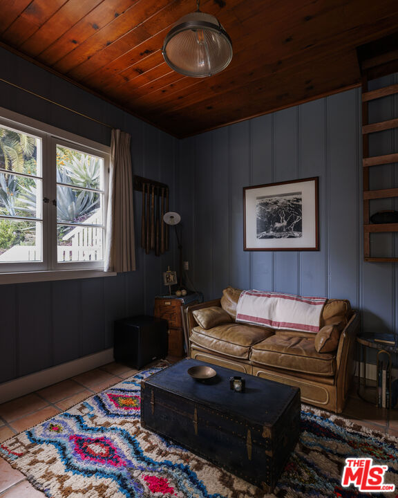 659 East Channel Road Santa Monica, CA 90402 - Photo 17 of 22 a living room with furniture and a rug