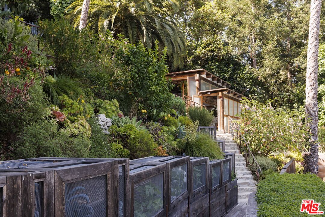 659 East Channel Road Santa Monica, CA 90402 - Photo 20 of 22 a view of a wooden fence and trees