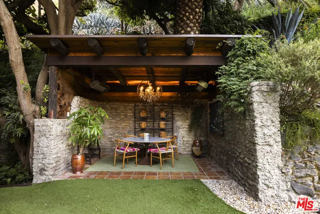 a view of yard with outdoor seating