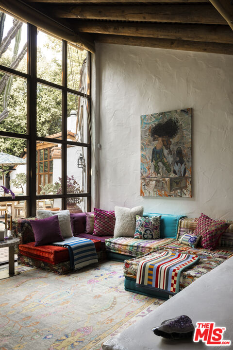 659 East Channel Road Santa Monica, CA 90402 - Photo 5 of 22 a living room with furniture and windows