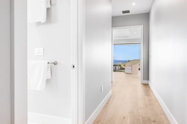 a bedroom with a large bed and a couch