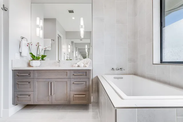 a close view of a sink and a mirror