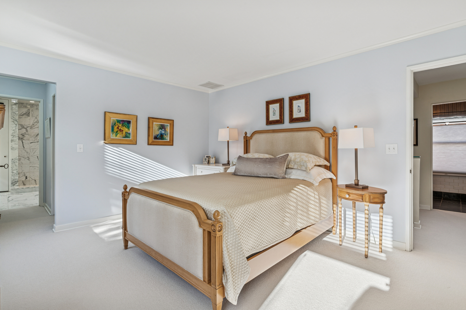 943 Westmoor Road Winnetka, IL 60093 - Photo 13 of 25 a bedroom with a bed and painting on the wall