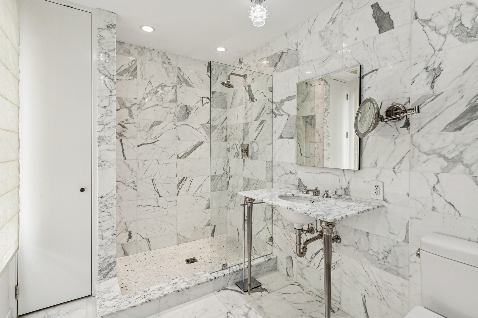 943 Westmoor Road Winnetka, IL 60093 - Photo 15 of 25 a bathroom with a shower and a sink