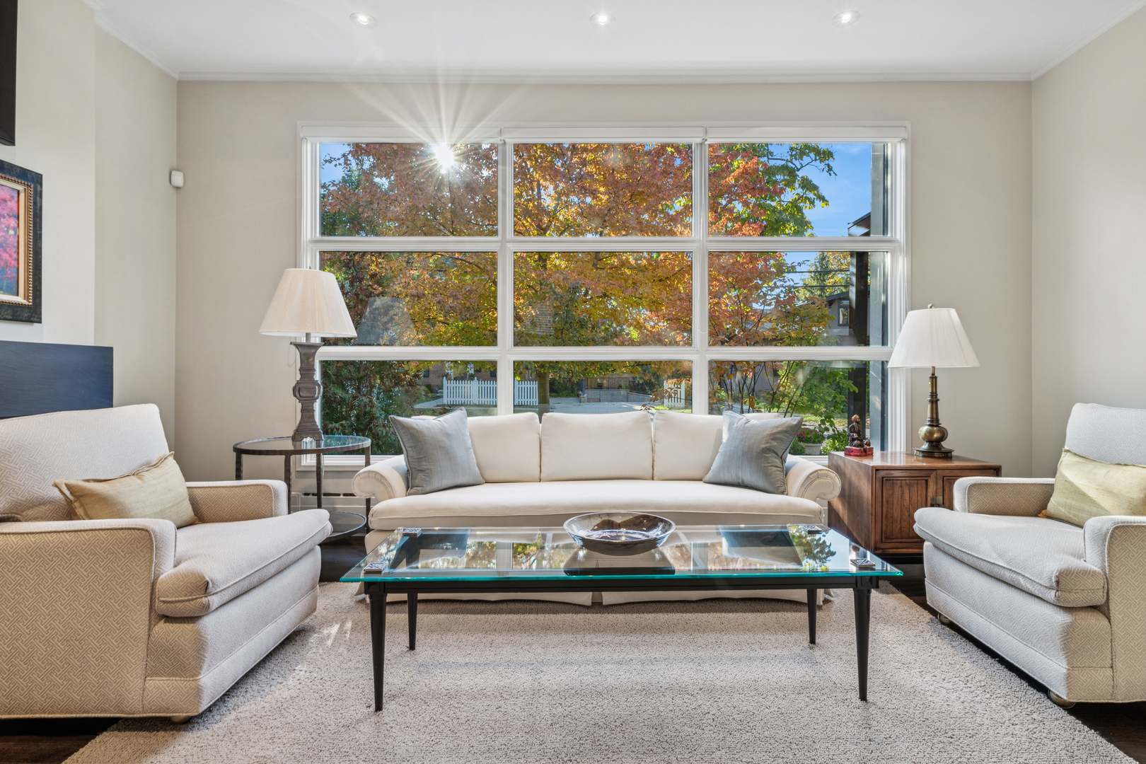 943 Westmoor Road Winnetka, IL 60093 - Photo 4 of 25 a living room with furniture a rug and a large window