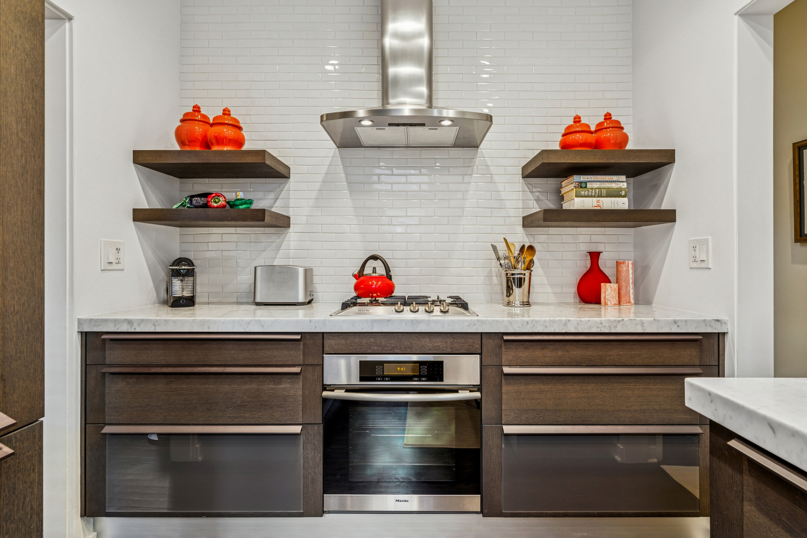 943 Westmoor Road Winnetka, IL 60093 - Photo 9 of 25 a kitchen with stainless steel appliances granite countertop and a sink