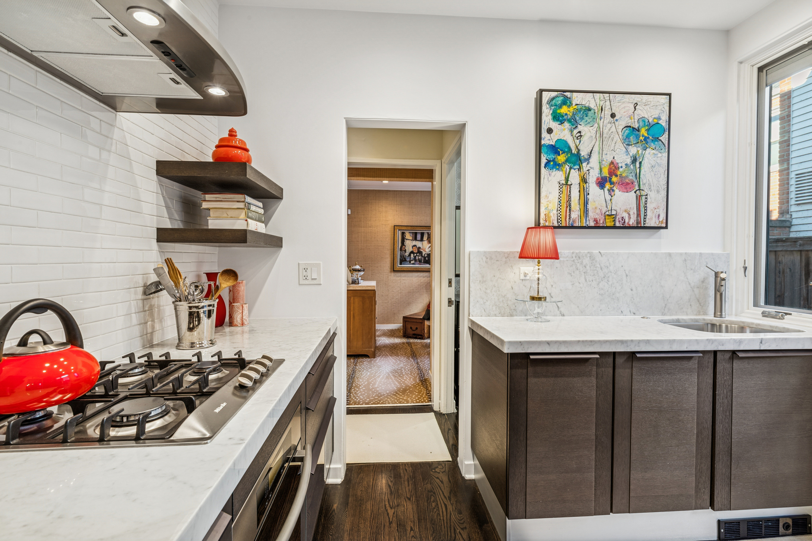943 Westmoor Road Winnetka, IL 60093 - Photo 10 of 25 a kitchen with stainless steel appliances a stove a sink and a refrigerator