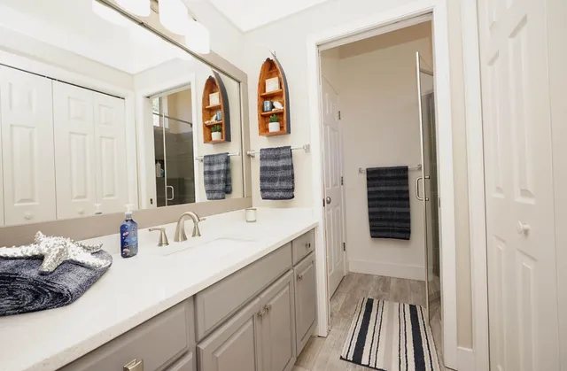 a view of swimming pool with a patio and a backyard