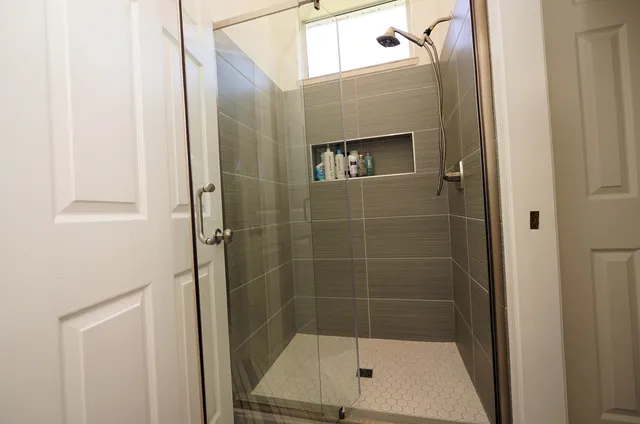 a view of a swimming pool with a patio