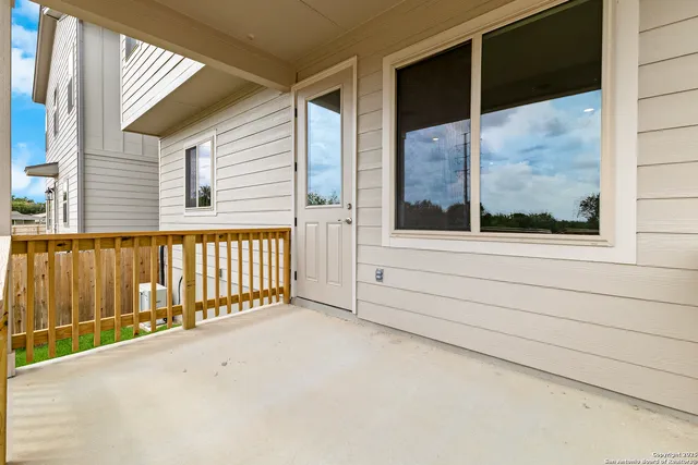 a view of a porch with a backyard