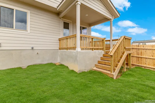 a view of a backyard with a garden