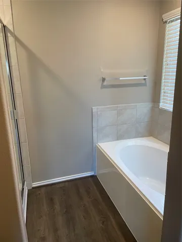 a bathroom with bathtub