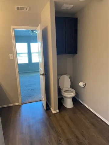 a bathroom with a toilet