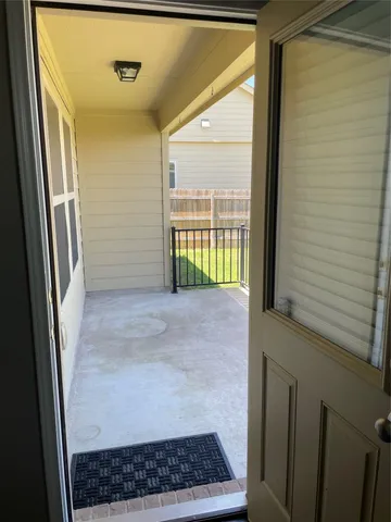 a view of a terrace with a garden