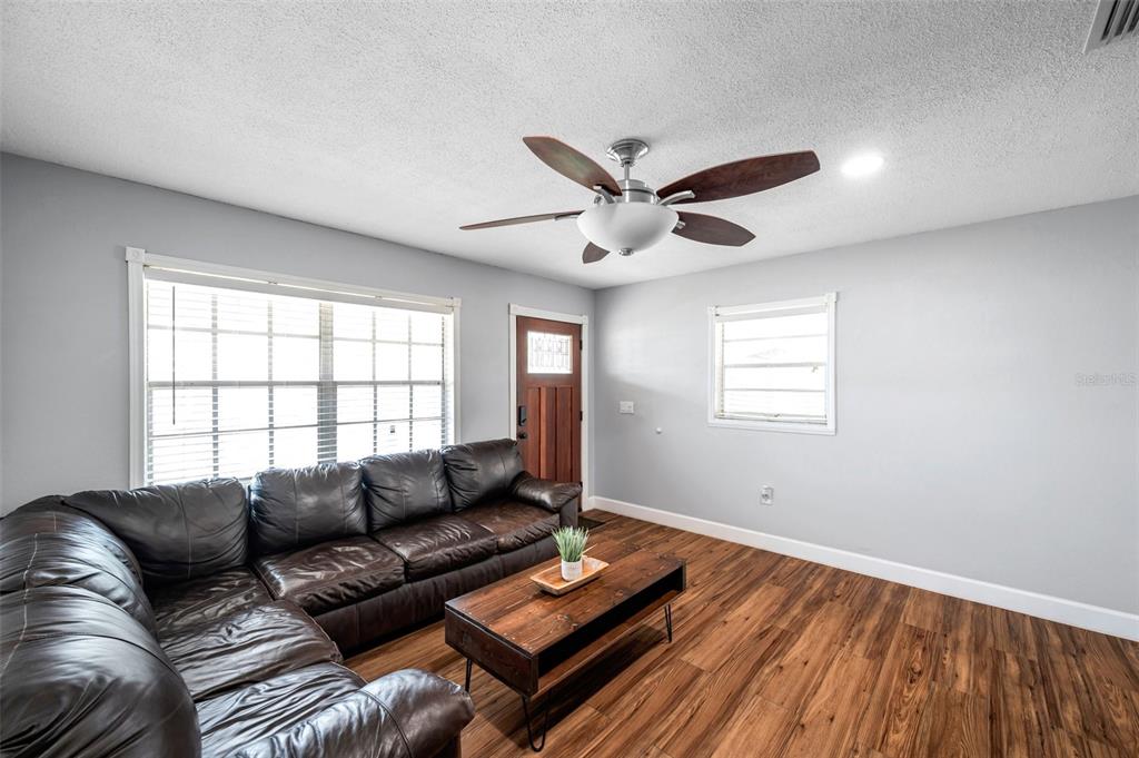 4815 Plantation Drive Tampa, FL 33615 - Photo 18 of 43 a living room with furniture and a window