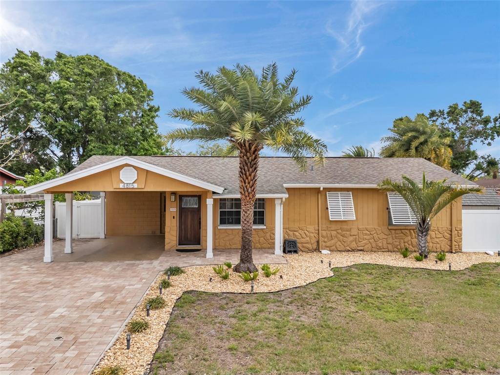 4815 Plantation Drive Tampa, FL 33615 - Photo 2 of 43 front view of a house with a yard