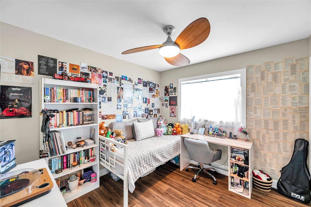 4815 Plantation Drive Tampa, FL 33615 - Photo 25 of 43 a workspace with furniture and a book shelf