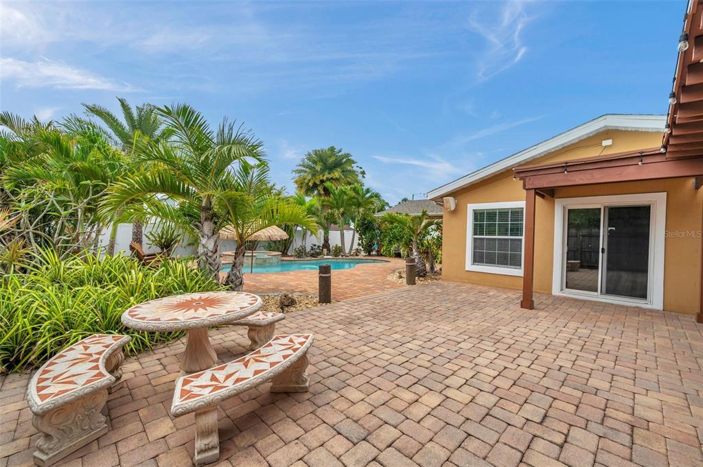 4815 Plantation Drive Tampa, FL 33615 - Photo 33 of 43 a view of a backyard with plants and a garden