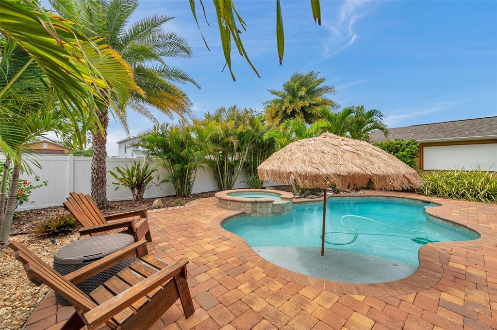 4815 Plantation Drive Tampa, FL 33615 - Photo 40 of 43 a view of a swimming pool with a patio