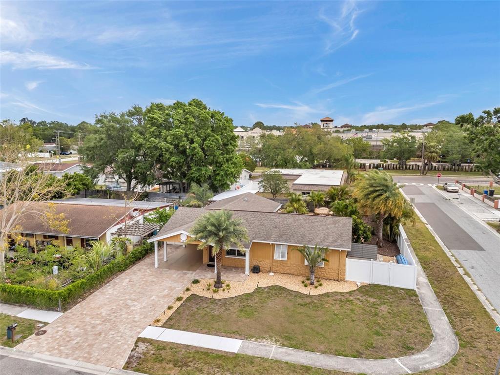 4815 Plantation Drive Tampa, FL 33615 - Photo 41 of 43 a view of a house with a yard