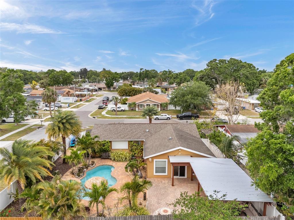 4815 Plantation Drive Tampa, FL 33615 - Photo 42 of 43 a aerial view of a house with a yard