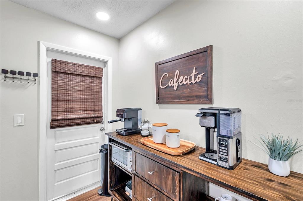 4815 Plantation Drive Tampa, FL 33615 - Photo 8 of 43 a kitchen with a sink and cabinets