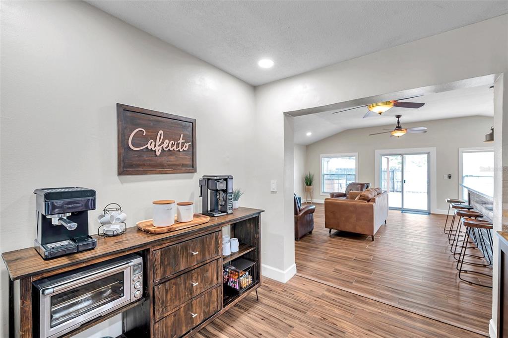4815 Plantation Drive Tampa, FL 33615 - Photo 9 of 43 a living room with furniture and wooden floor