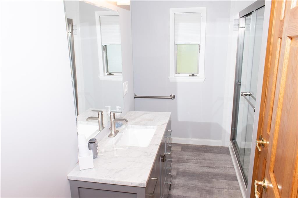 3124 Main Street Aliquippa, PA 15001 - Photo 19 of 30 a bathroom with a sink and a mirror