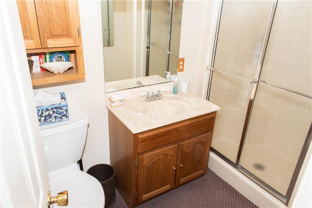 3124 Main Street Aliquippa, PA 15001 - Photo 25 of 30 a bathroom with a sink toilet and mirror