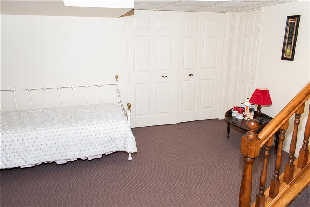 3124 Main Street Aliquippa, PA 15001 - Photo 27 of 30 a bedroom with a bed and a window
