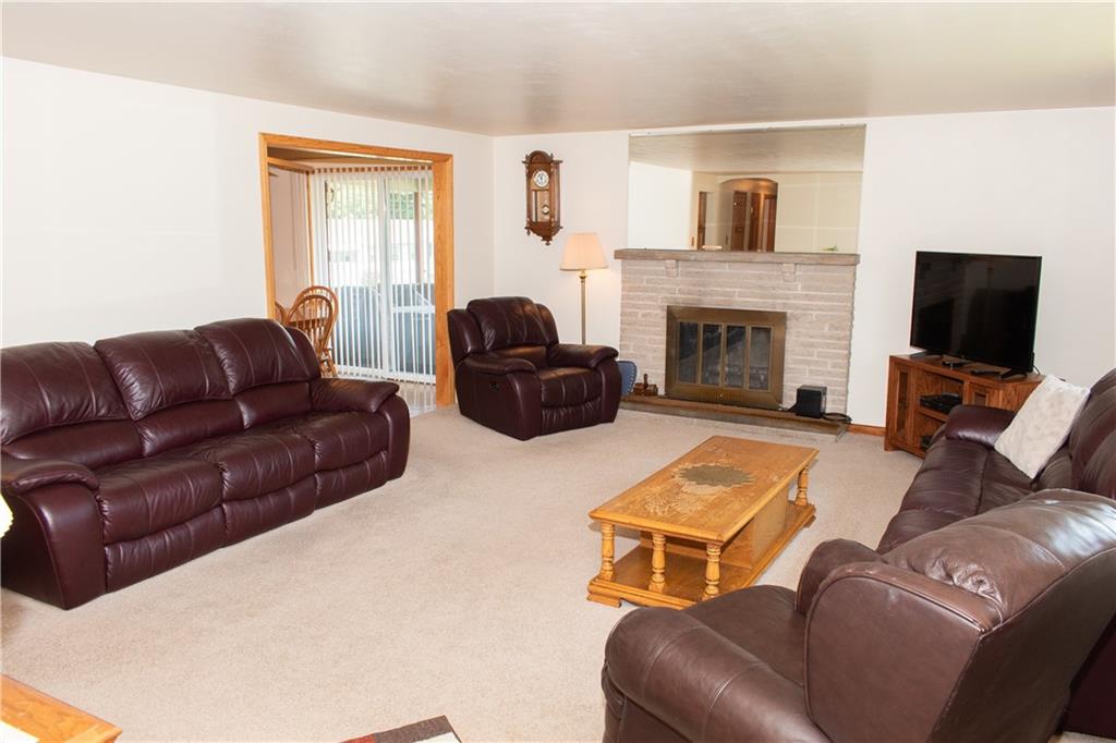 3124 Main Street Aliquippa, PA 15001 - Photo 9 of 30 a living room with furniture and a fireplace