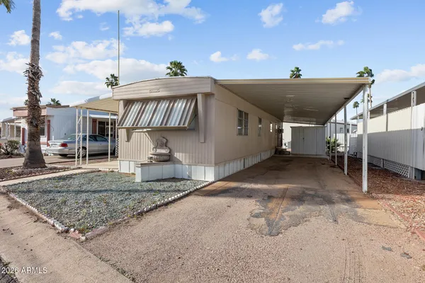 a view of a house with a patio