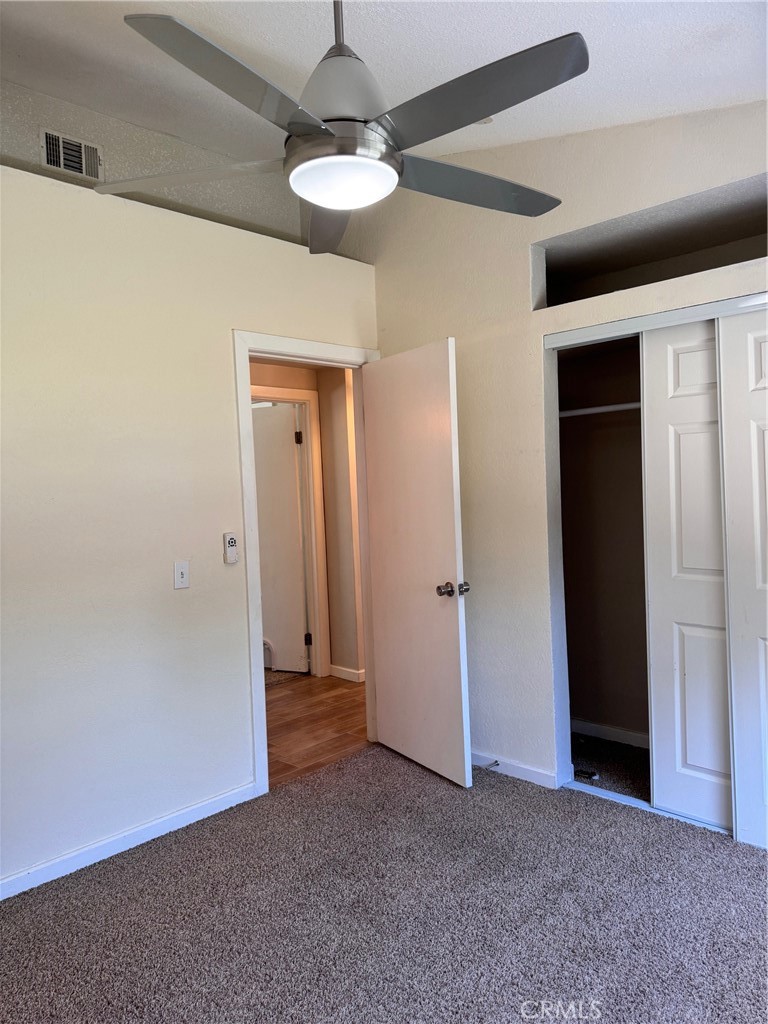 30628 Moontide Court Temecula, CA 92592 - Photo 25 of 53 a view of a livingroom with a chandelier fan