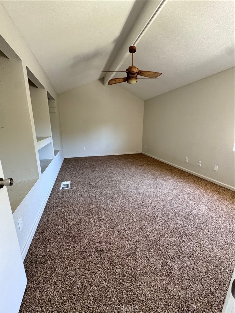 30628 Moontide Court Temecula, CA 92592 - Photo 29 of 53 an empty room with a wooden floor and windows